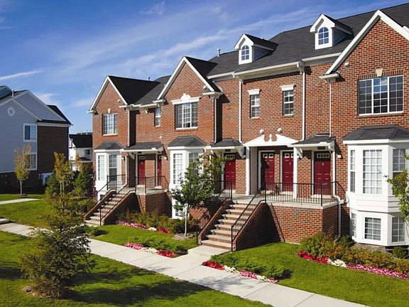 brick townhome landscaping